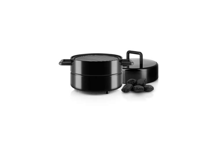 The Eva Solo To Go Grill is compact and each element stacks on one another and fastens with a polyester band around the entire unit; €\160 (\$\186 USD) at Connox.