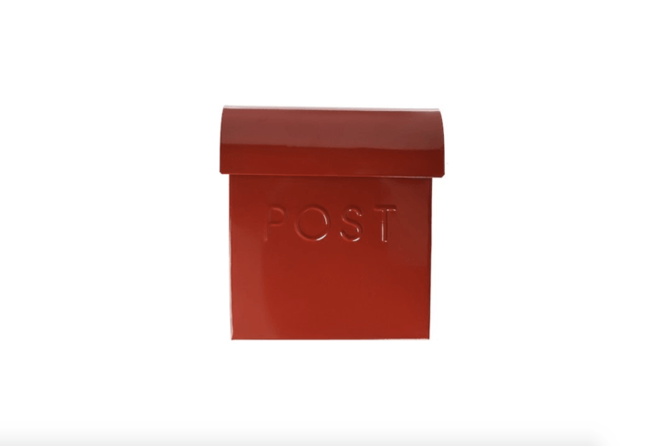 A red wall-mounted Euro Mailbox made of metal is powder-coated for rust protection; available in seven colors, from \$38.\2\2 via Amazon.