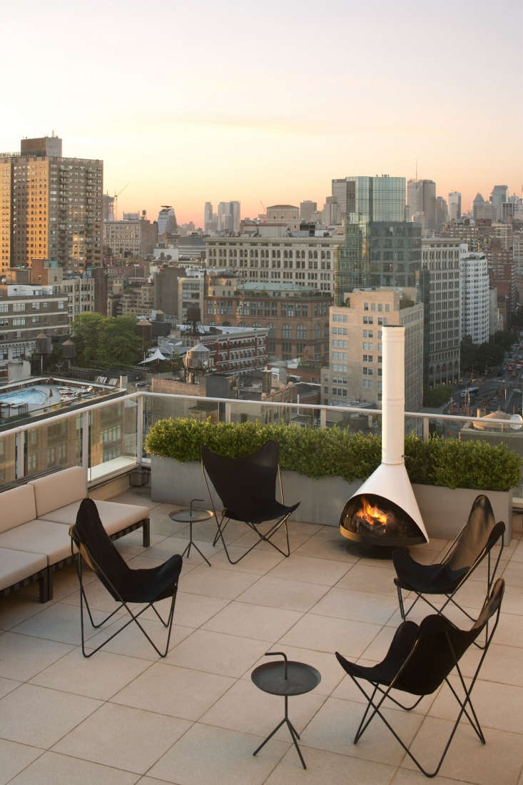 An outdoor dining area for a Bowery penthouse in Manhattan. for more, see Magdalena Keck Interior Design in our Architect and Designer Directory. Photograph by Jeff Cate.