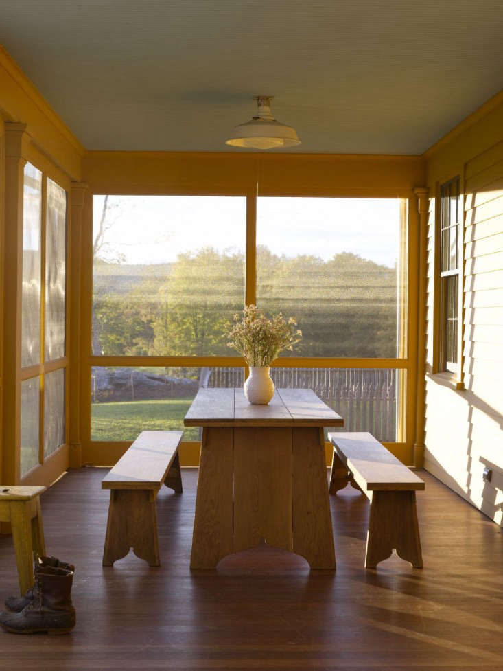 “The decision to screen the porch was pretty obvious,” says architect Rafe Churchill. “Not only can it get pretty buggy after sunset but also the screening of the porch really adds to the intimacy of the space and allows for sleeping in the open air.” Photograph by John Gruen, from The Architect Is In: The New Connecticut Farm, Sustainable Edition.