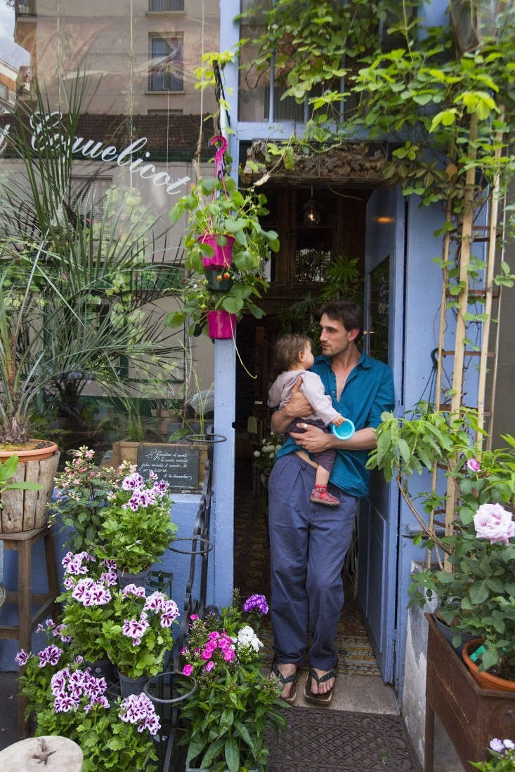 Tom des Fleurs, the fleurist at Bleuet Coquelicot near Paris’s Canal St. Martin, painted his storefront in a bright pastel shade of lavender-blue (his store name after all means “blue poppy”): No. \136 French Lavender from Designers Guild. Photography by Mimi Giboin from Shopper’s Diary: Bleuet Coquelicot in Paris.