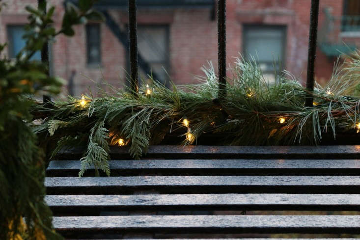 The fire escape, dressed for winter. Photograph by Erin Boyle from DIY: A Holiday Fire Escape.