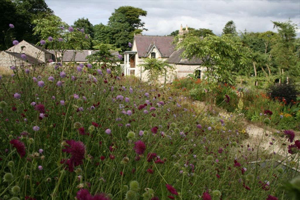 The view from the garden to the Cow House.