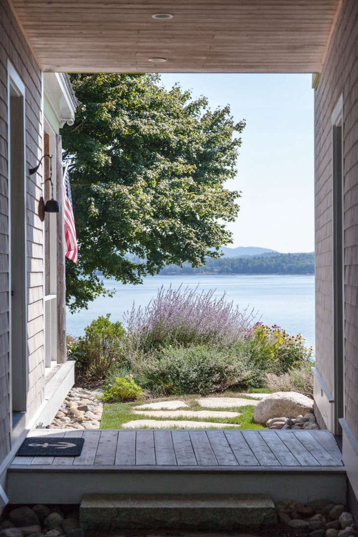 The quintessential cladding for the Maine seaside cottage? Well-weathered shingles, the grayer the better. Photograph from Landscape Architect Visit: Clamshell Alley on the Coast of Maine.