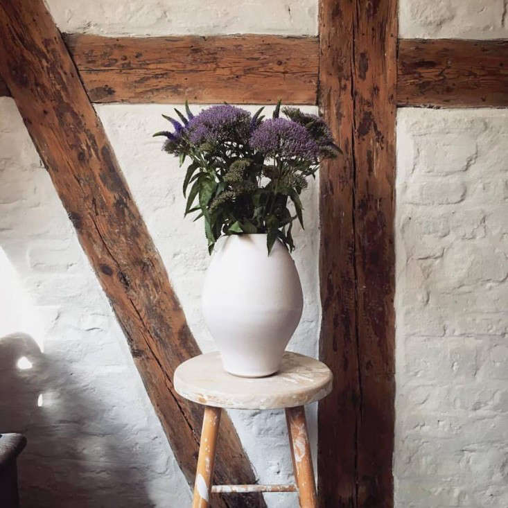 tortus-studio-vase-purple-flowers-brick-wall-copenhagen-gardenista