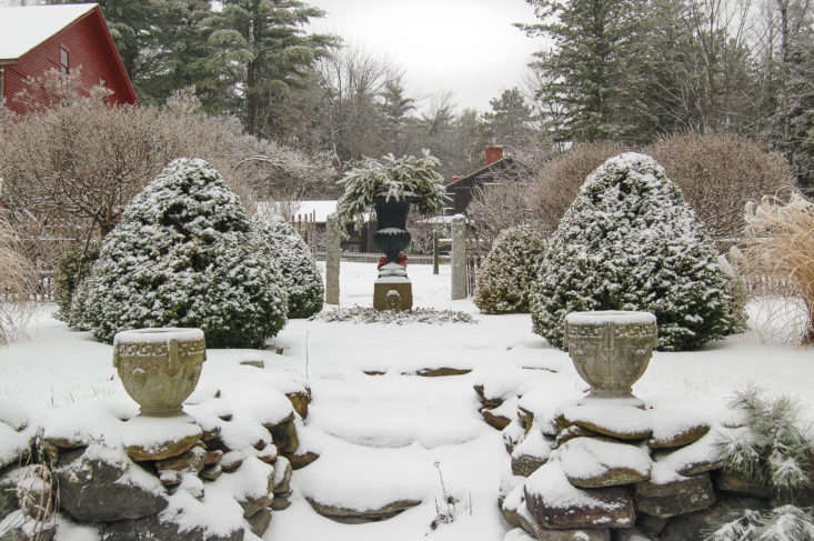 Prepping the garden for winter? Take cues from this sculptural New Hampshire garden, which looks even more charming with a first dusting of snow. See Garden Visit: At Home at Juniper Hill Farm; photograph by Joseph Valentine.