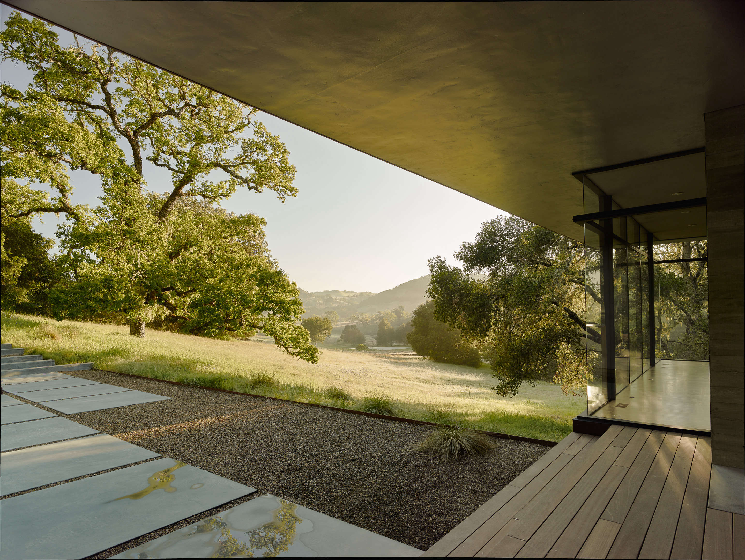 The view from the outdoor living room toward the golf course.