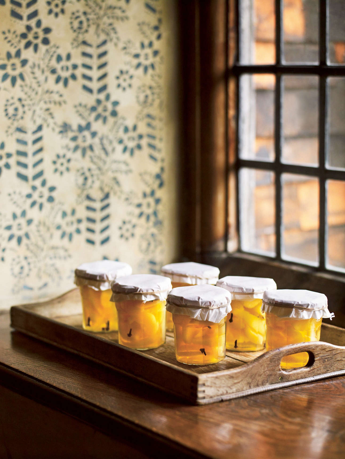 Pickled pears in a window at Great Dixter.
