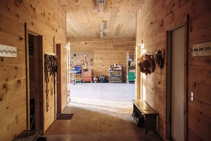 The hallway leads to the office, feed room, and cold storage.