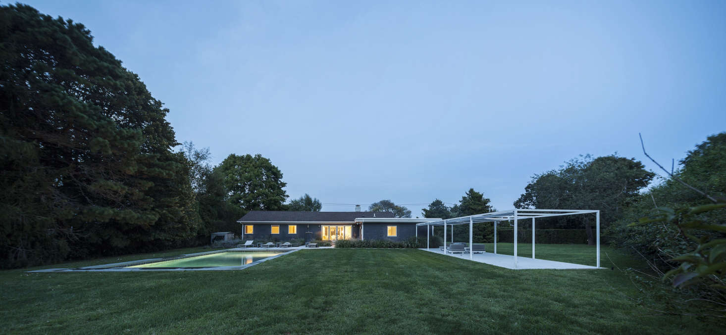 In balance: the pool, illuminated, alongside the veranda. (See Easy Pieces: Underwater Landscape Lights.)
