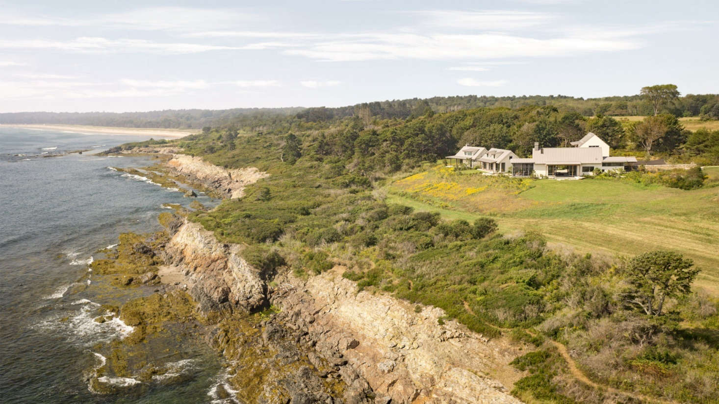 Throughout the coastal property, the landscape architect planned long stretches of trails and boardwalks through meadow, woodlands, wetland, and shoreline.