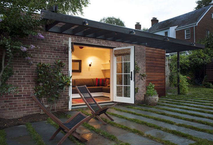 Architect Catherine Fowlkes of Fowlkes Studio converted a unused garage into a guest cabana and to create direct access from the house into a large backyard. Photograph by Brandon Webster courtesy of Fowlkes Studio.