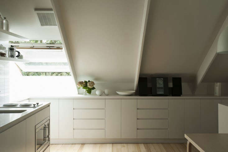 Designer Karin Montgomery Spath transformed a garage, for clients to live in while their house in Auckland was being renovated. “I suggested that I could make a loft apartment above the two-car garage for them to live in during the renovation, and that it wouldn’t cost much more than a rental,” says Karin. Photograph by Matthew Williams.