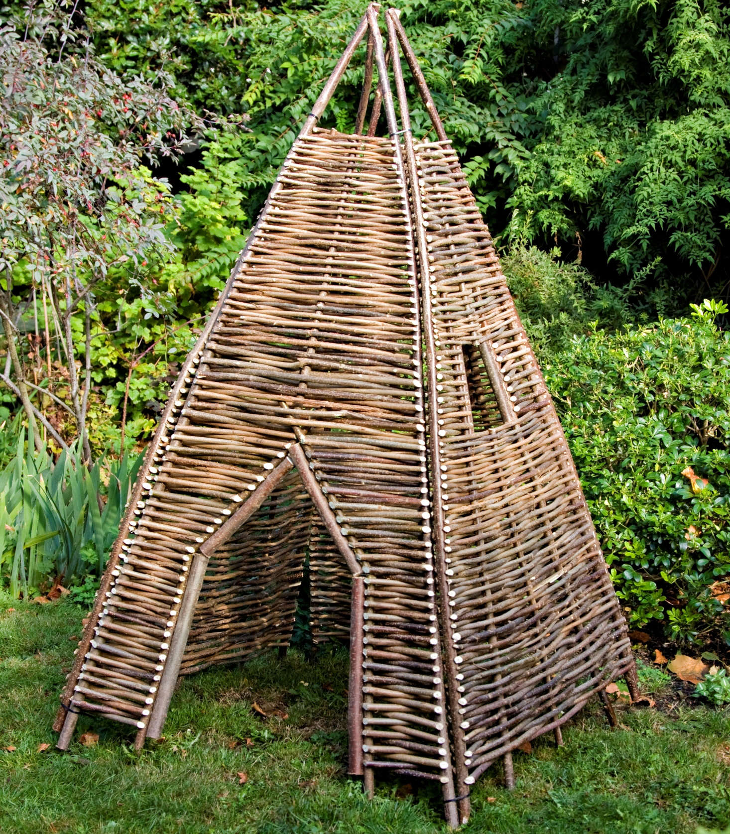 The Twigwam is one of a group of woven play structures from London garden accessories company Chairworks. This one is made in Russia of woven hazel branches. It comes in four panels that get cable-tied together (and are easy to disassemble for storage).