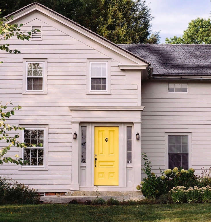  The front door paint color is Van Gogh Yellow by Fine Paints of Europe. &#8\2\20;This color has really settled down over a couple of years,&#8\2\2\1; says Berman.  I miss its vibrancy, but it was such a statement when we first put it up.  It probably took about a year for the clients to finally embrace it.&#8\2\2\1;