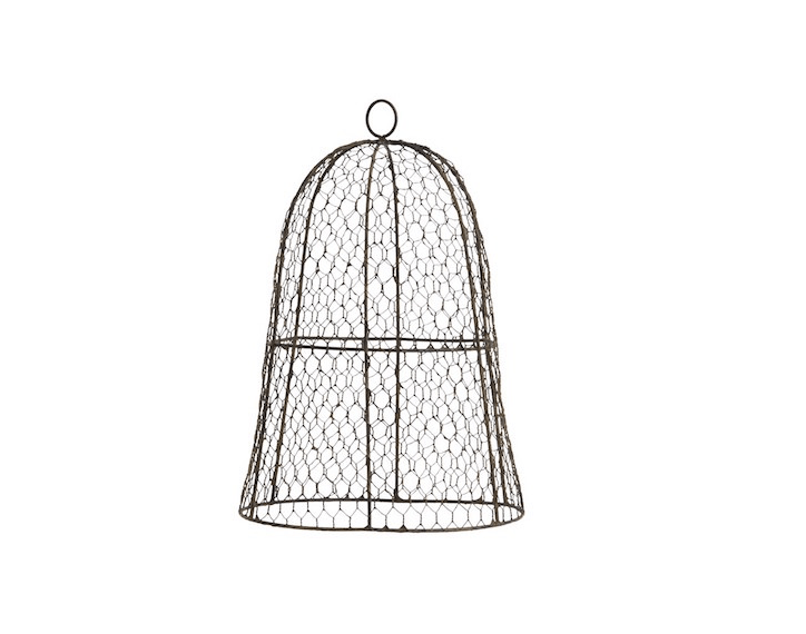 An aged black Medium Wire Cloche has an elongated shape (it is approximately \14.5 inches tall) that makes it suitable to display decorative objects; \$\29.95 from Provincial Living.