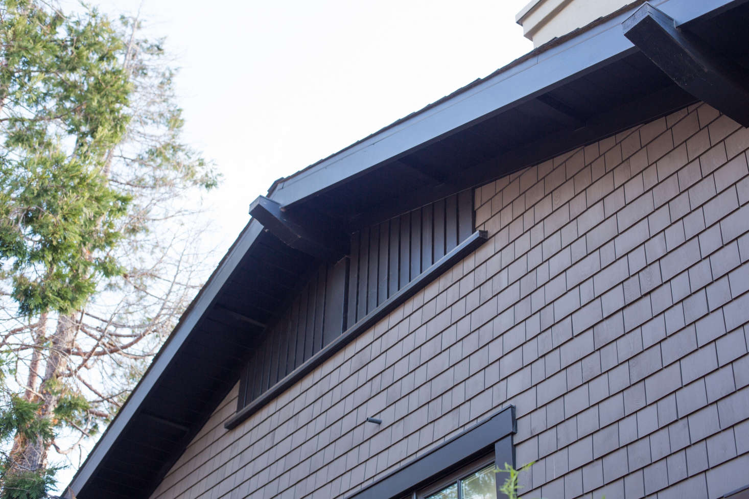 City building codes required large attic vents for air circulation so Haegglund designed a large-scale screen to make a visual statement beneath the eaves. 
