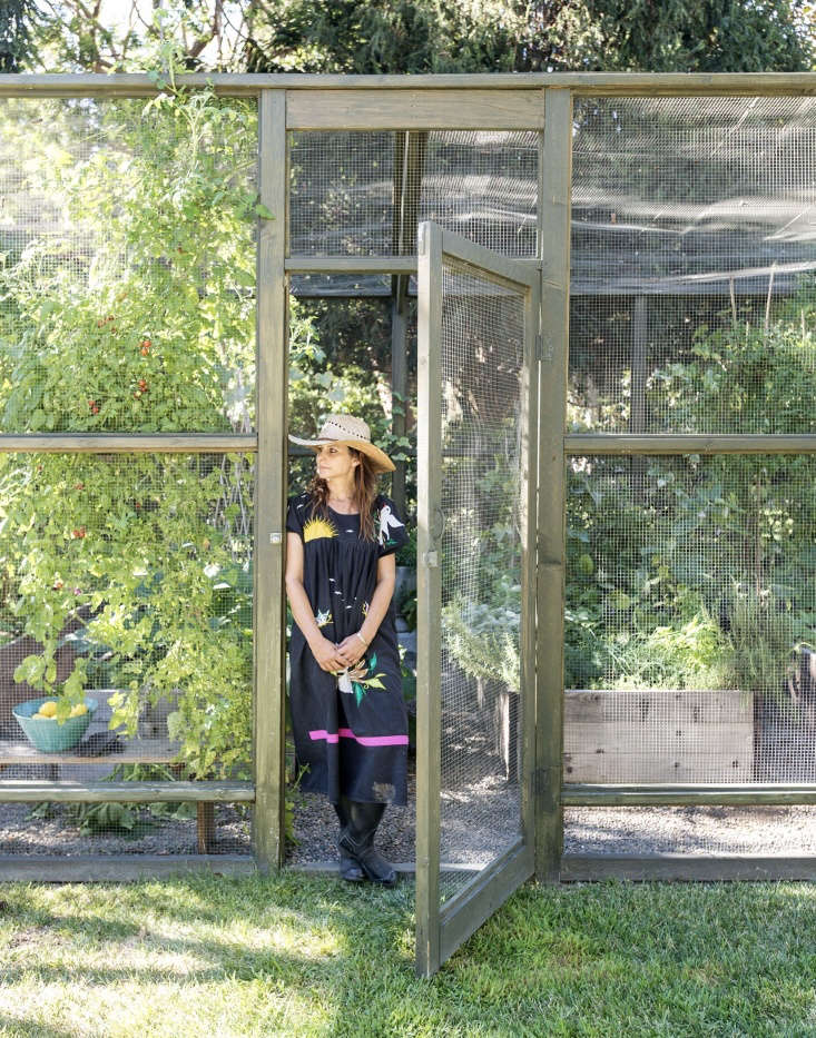 Lauri Kranz at an edible garden she designed in Los Angeles. Photograph by Matthew WIlliams for Gardenista.