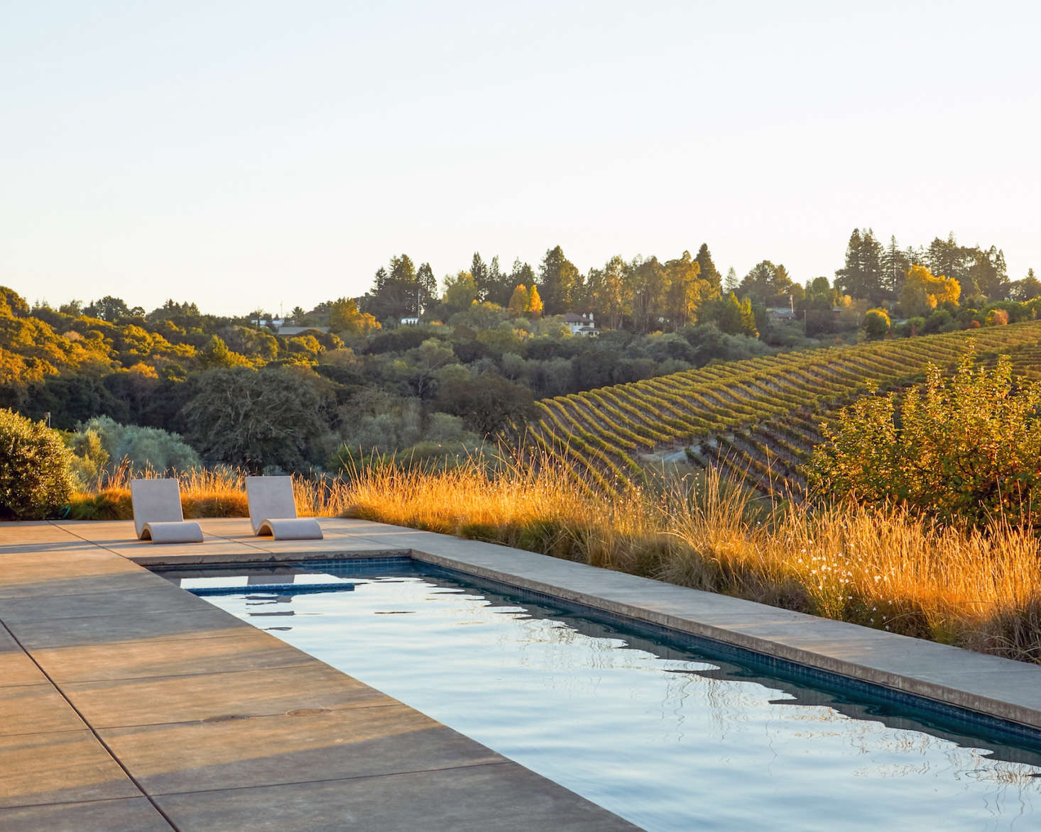 The pool does not have an infinity edge, explains Cochran, but its long side is close enough to the terrace boundary to make it feel like an infinity pool.