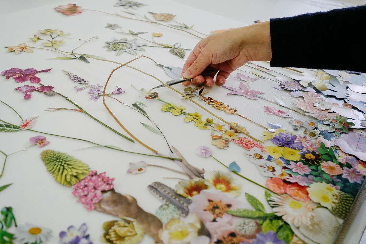 Anne arranges each ‘plant’ prior to gluing each piece individually on mounting pins.