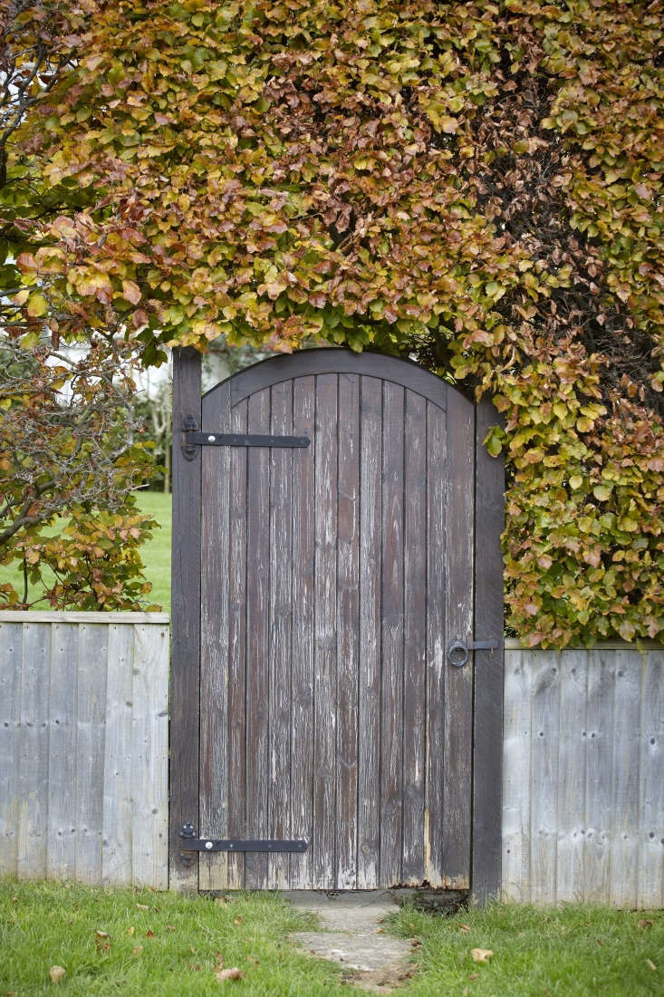 An arch is a triumphal symbol, and the style this gate references its ancient antecedent, the rounded Roman arch that offered quiet support to a surrounding structure.