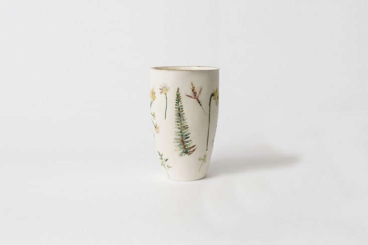 The Felicity Jones Wild Garden Unglazed Round Vase is made from pressed flowers collected from Petersham Nurseries&#8\2\17; flower garden and placed into clay; £\180 (\$\24\1 USD).