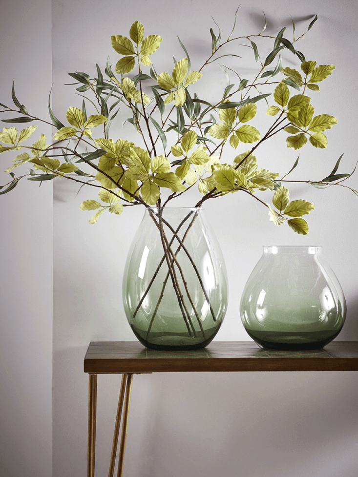 A Green Glass Vase is available in two sizes, for £45 or £55, depending on size, from Cox & Cox.