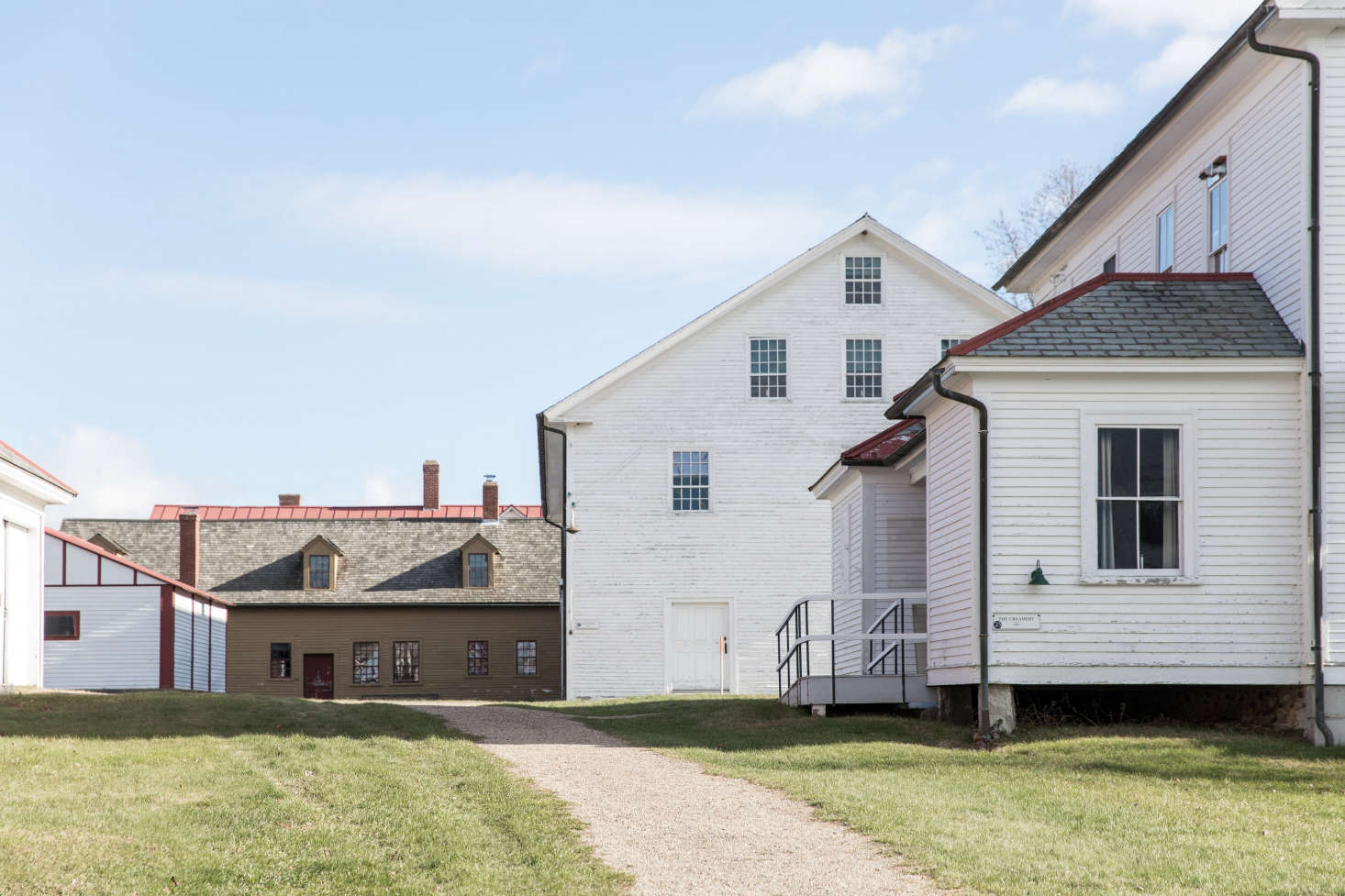 The Shakers lived communally, and their villages were designed like small towns, with one shared dwelling house (where they slept) and separate buildings for the laundry, broom-making workshop, creamery, and schoolhouse, plus fields, gardens, and orchards. But the village buildings looked charmingly cohesive, never clashing. The secret to their success? When painting, make like the Shakers and consider how your house fits in with your neighbors