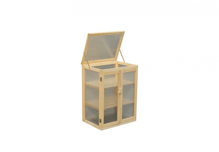 Made of fir, a Mini Greenhouse with two shelves and a ventilated lid has UV-proof polycarbonate panels; £88.99 from Wayfair.