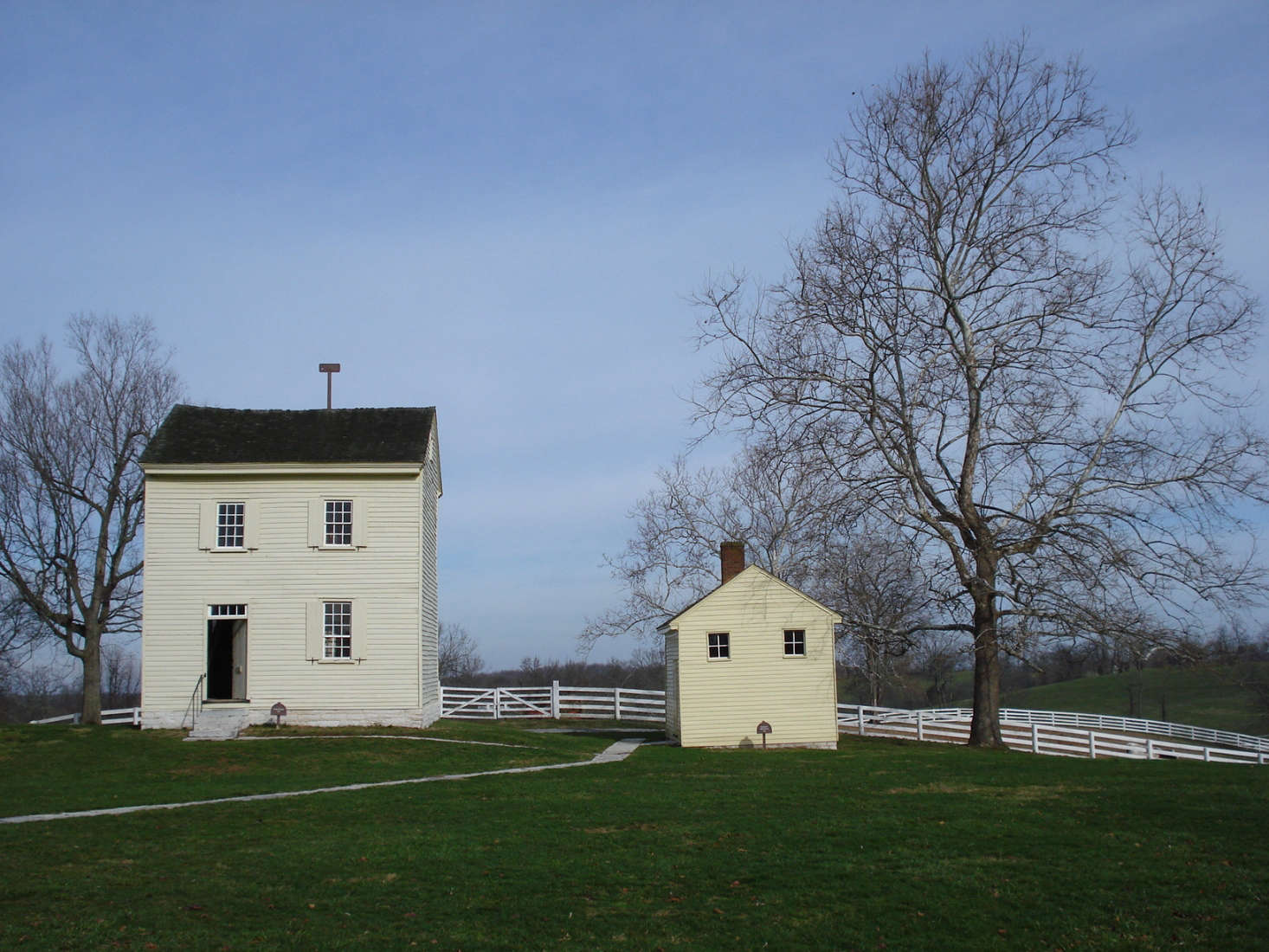 The Shakers designated buildings for specific purposes. You, too, can do this in the garden: Even one small structure, particularly when painted in complement to the main house (see 