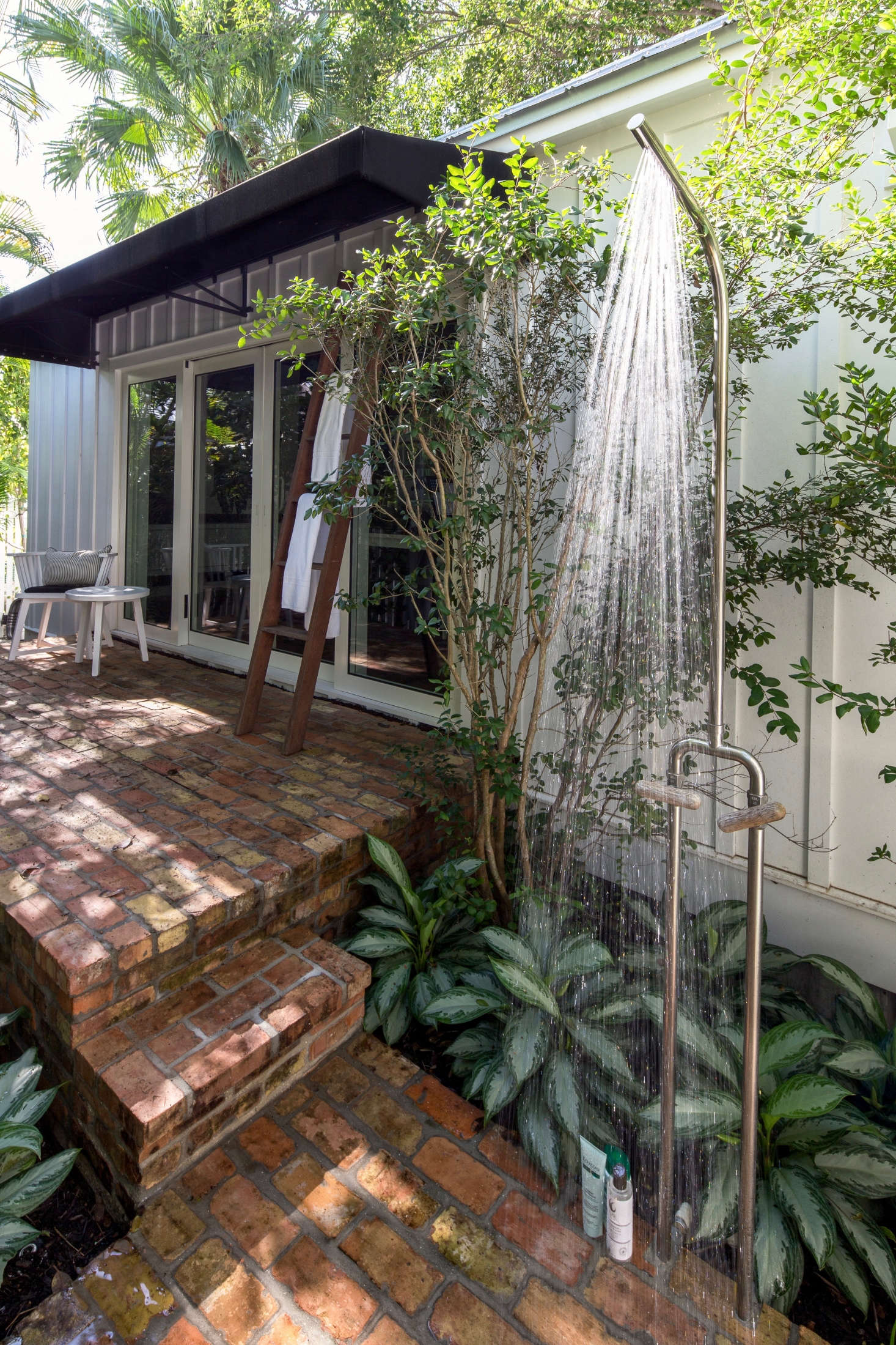 Near the master bedroom is a Pila Wall Mount Shower from Calazzo