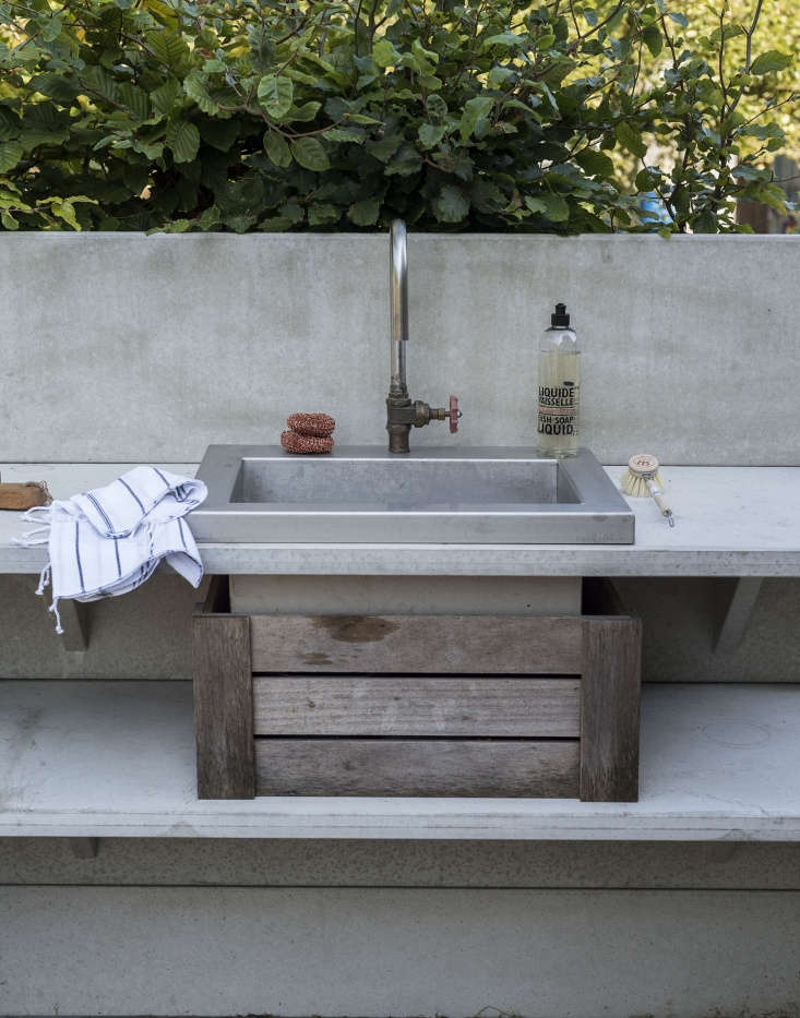 The stainless-steel WWOO sink, photographed by Matthew Williams for Gardenista: The Definitive Guide to Stylish Outdoor Spaces, is rigged with the Chicago Faucets Rigid Swing Gooseneck Sprout (GN\2AE3JKABCP) which is \$56.\26 at Pro Dryers. See more of the WWOO kitchen at A Modernist’s Outdoor Kitchen: Low-Tech, High Style from WWOO in the Netherlands.