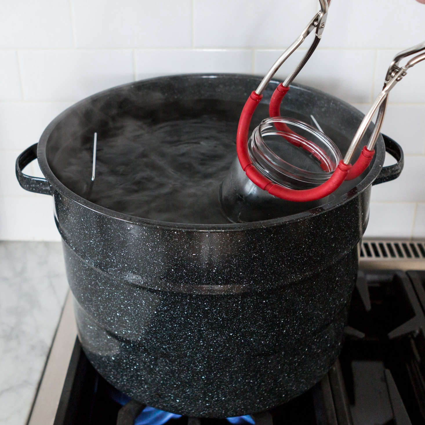 Now, with everything in its right place, we need to sterilize the jars and lids.