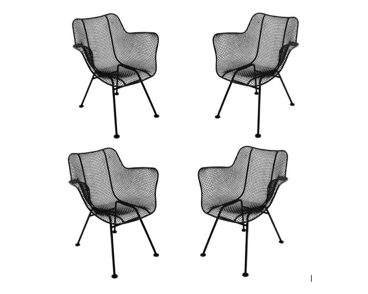 A set of 4 vintage Sculptura Chairs is $