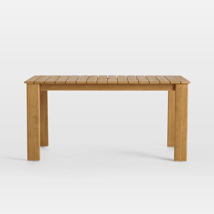 The Playa Outdoor Dining Table, made with FSC-certified mahogany wood, is \$599 at West Elm.