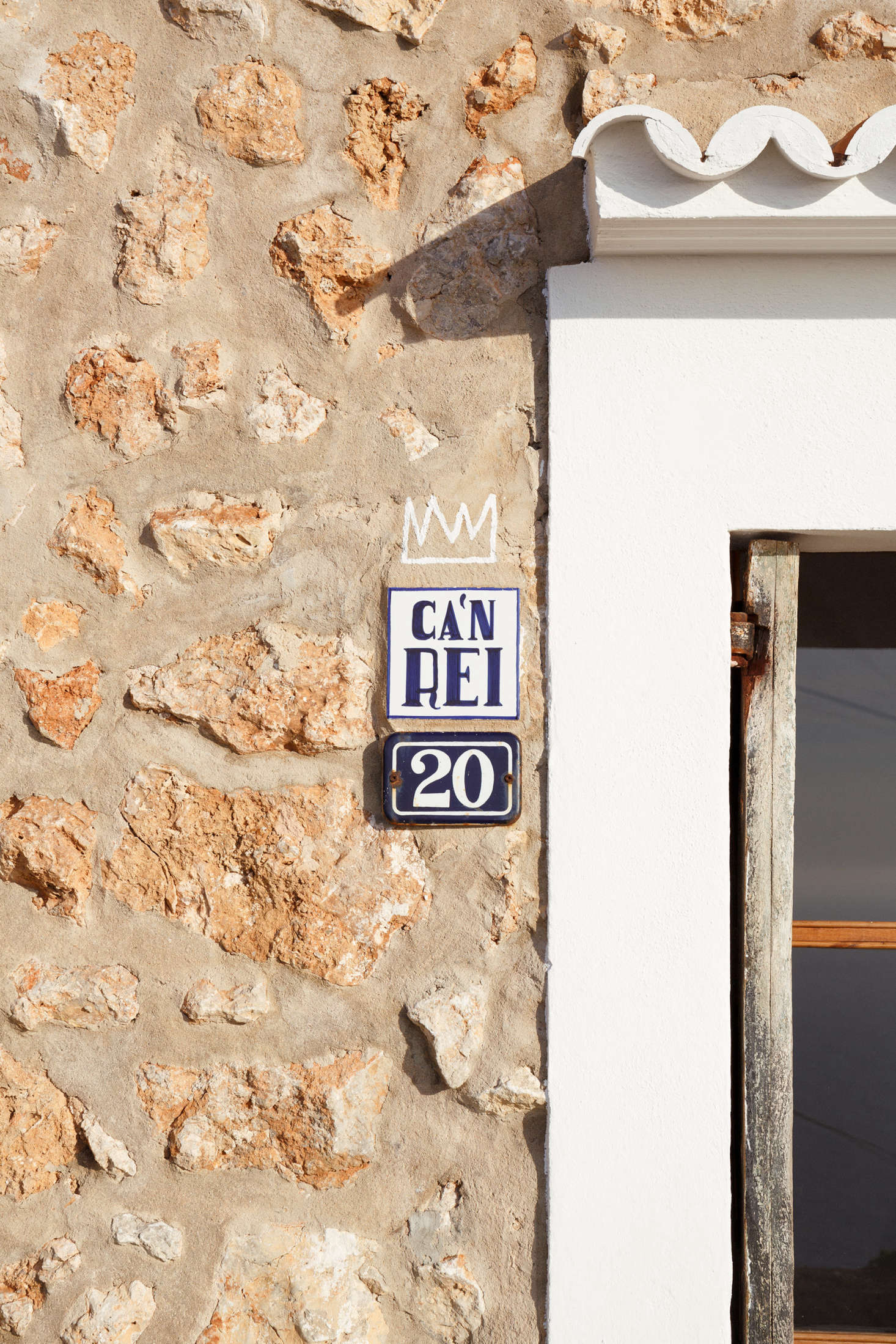 A hand-drawn crown adds some whimsy. (For more playful ideas for house numbers, see Curb Appeal: 9 Quick Fixes with House Numbers.)