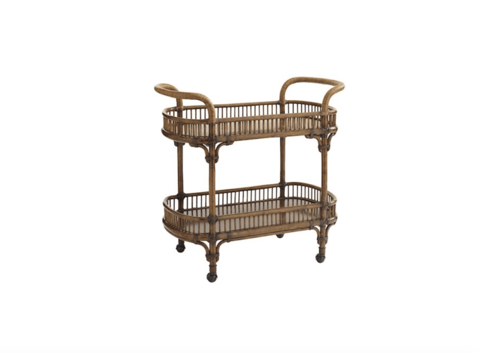 With &#8\2\20;a frame built from wood and cocoa shell veneer shelves, and adorned in rattan wrapped handles,&#8\2\2\1; a Veranda Bar Cart from the Tommy Bahama Bali Hai Collection is \$\1,679.