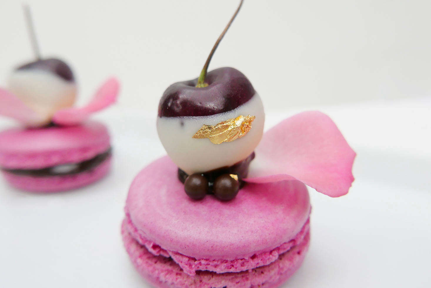 Kristel says her Italian-style macaroons are the trickiest item in her repertoire—made even more difficult with a chocolate-dipped and gilded cherry balanced on top.