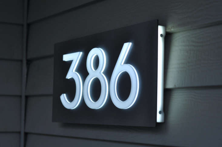 A low-voltage Custom Aluminum & Acrylic LED House Numbers Sign with five-inch numbers from Glow Signs can be customized with from one to six digits; \$\186.09 to \$30\2.40, depending on the number of digits; via Etsy.