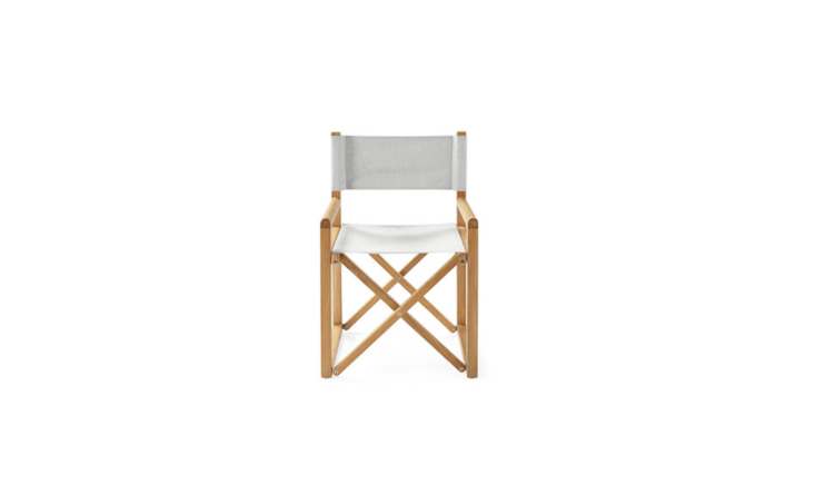 Covered in all-weather Sunbrella fabric, a solid teak Directors Chair chair is \$498 from Serena & Lily.