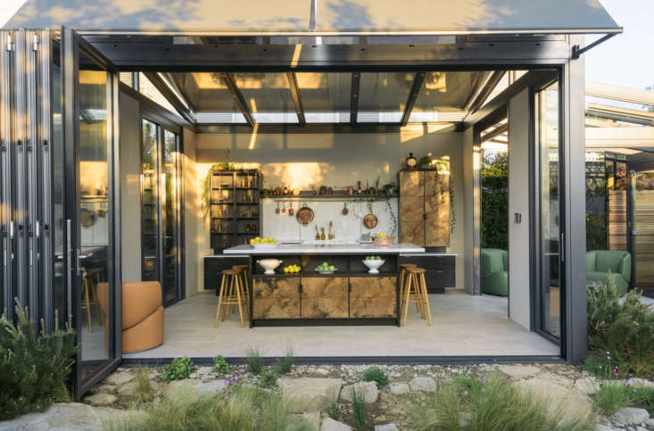 UK-based  Caulfield Co., makers of state-of-the-art glass structures, commission Charlie Smallbone and deVol to create copper fittings and fixtures to stand up to the elements in a conservatory kitchen. Photograph courtesy of deVol.