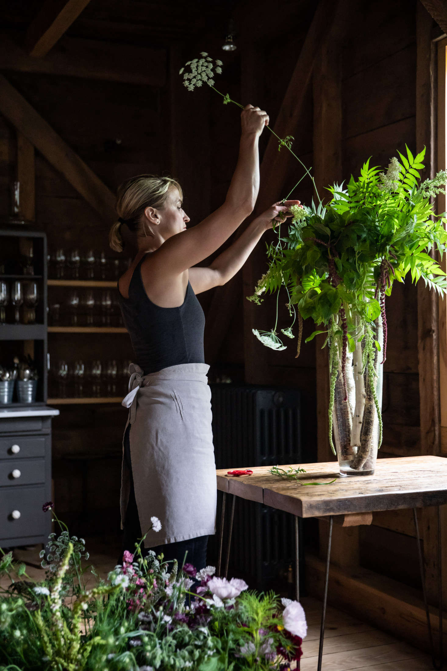 Most of the fittings at the Lost Kitchen are budget and vintage finds, from the antique china to the retro refrigerator and sink in the open kitchen. French