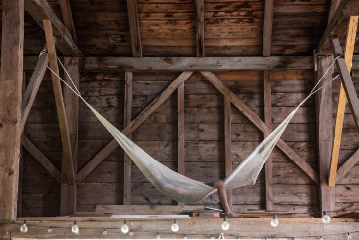 A hammock hung in the loft of the barn, for rare moments of rest.