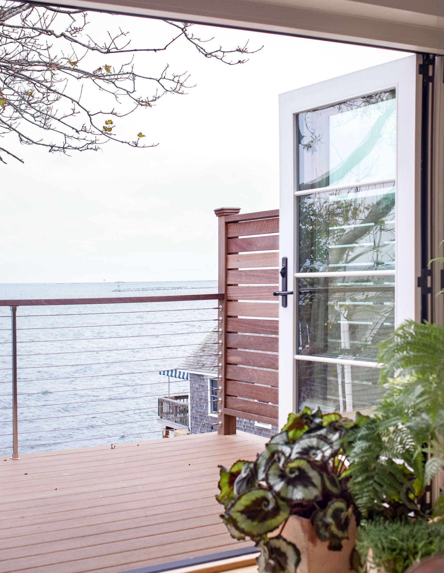 See more of this Cape Cod balcony deck at Out at Sea: A Shipshape Renovation in Provincetown by Hein+Cozzi. Photograph by Justine Hand.