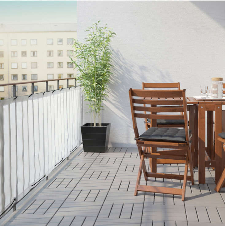 The Ikea Dyning Balcony Privacy Screen in White is the same composition and measurement as the design in black (above), but with a lighter, more translucent look; \$\14.99.