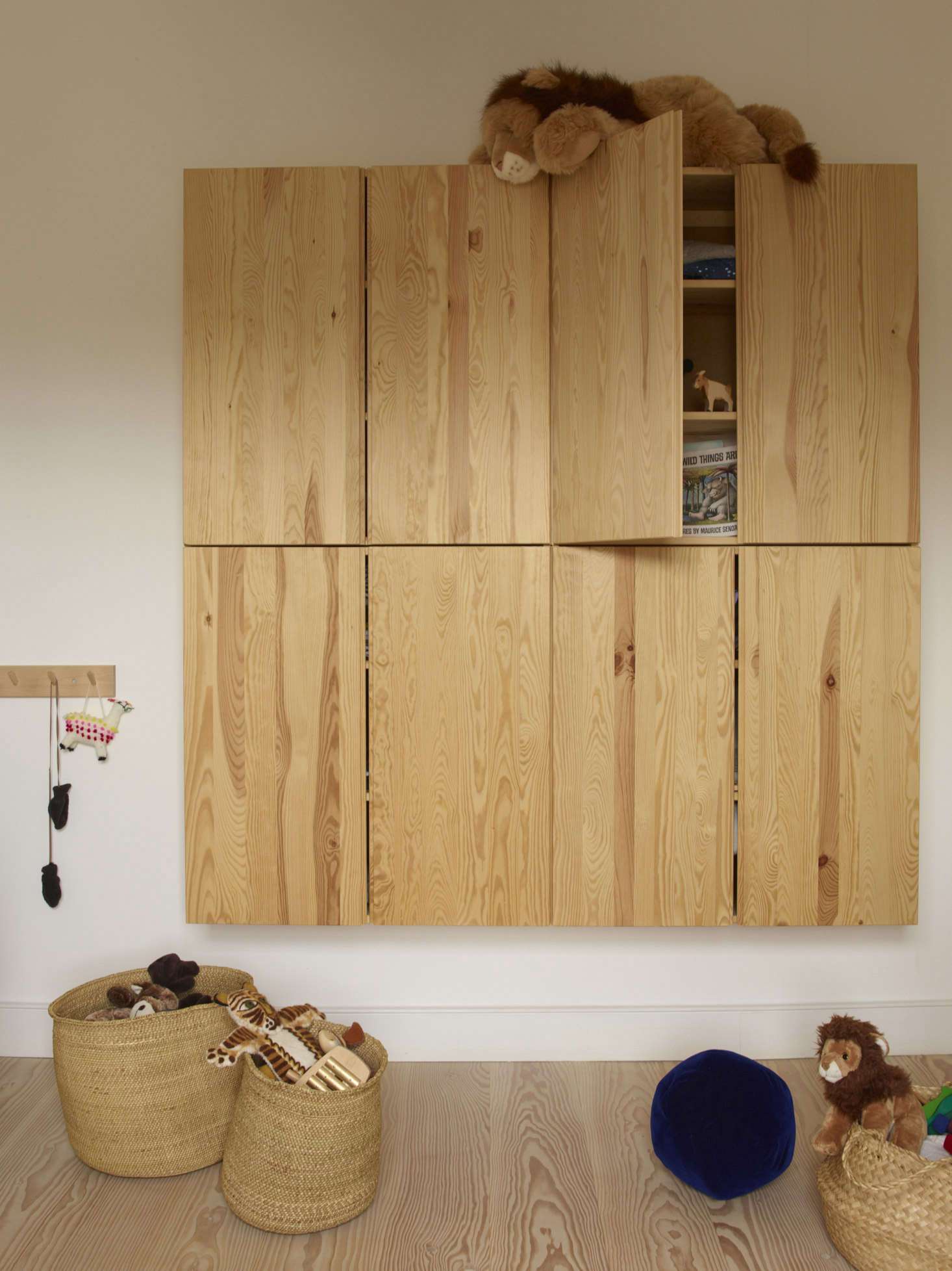 One of our favorite Ikea storage lines, the Ivar wall unit is perfect here for a child