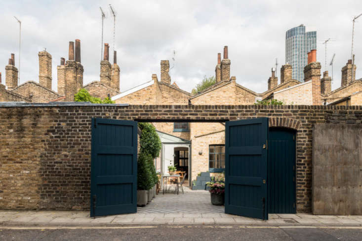 With the doors open, a car can pull in and park in the courtyard (you can roll aside the wooden planters, which are on wheels, before parking).