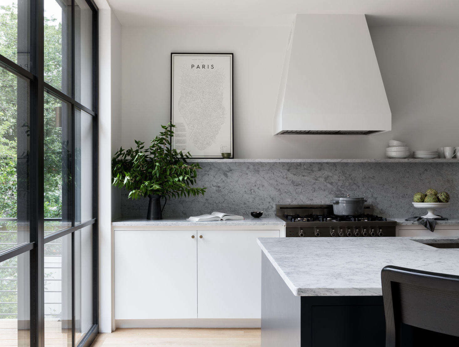 Big, monumental marble backsplashes, like this Carrara one in a Jersey City home, are a trend. See more examples in Favorite Marble Kitchen Backsplashes, for Maximum Drama. Photograph by Haris Kenjar.