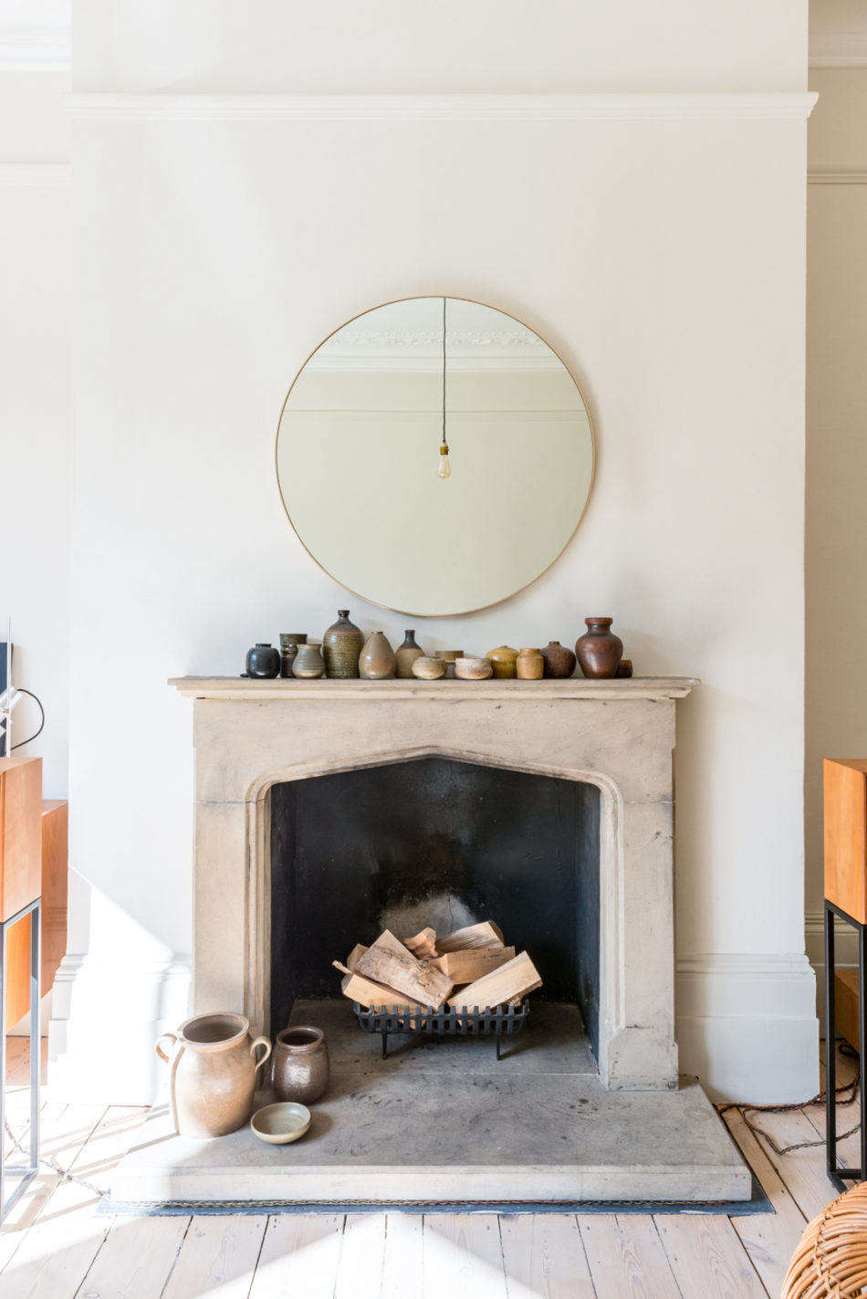 A much coveted feature for fall—the handsome old fireplace. Photograph courtesy of The Modern House, from English Translation: A Compact Victorian Gets an Eclectic but Cohesive Makeover.