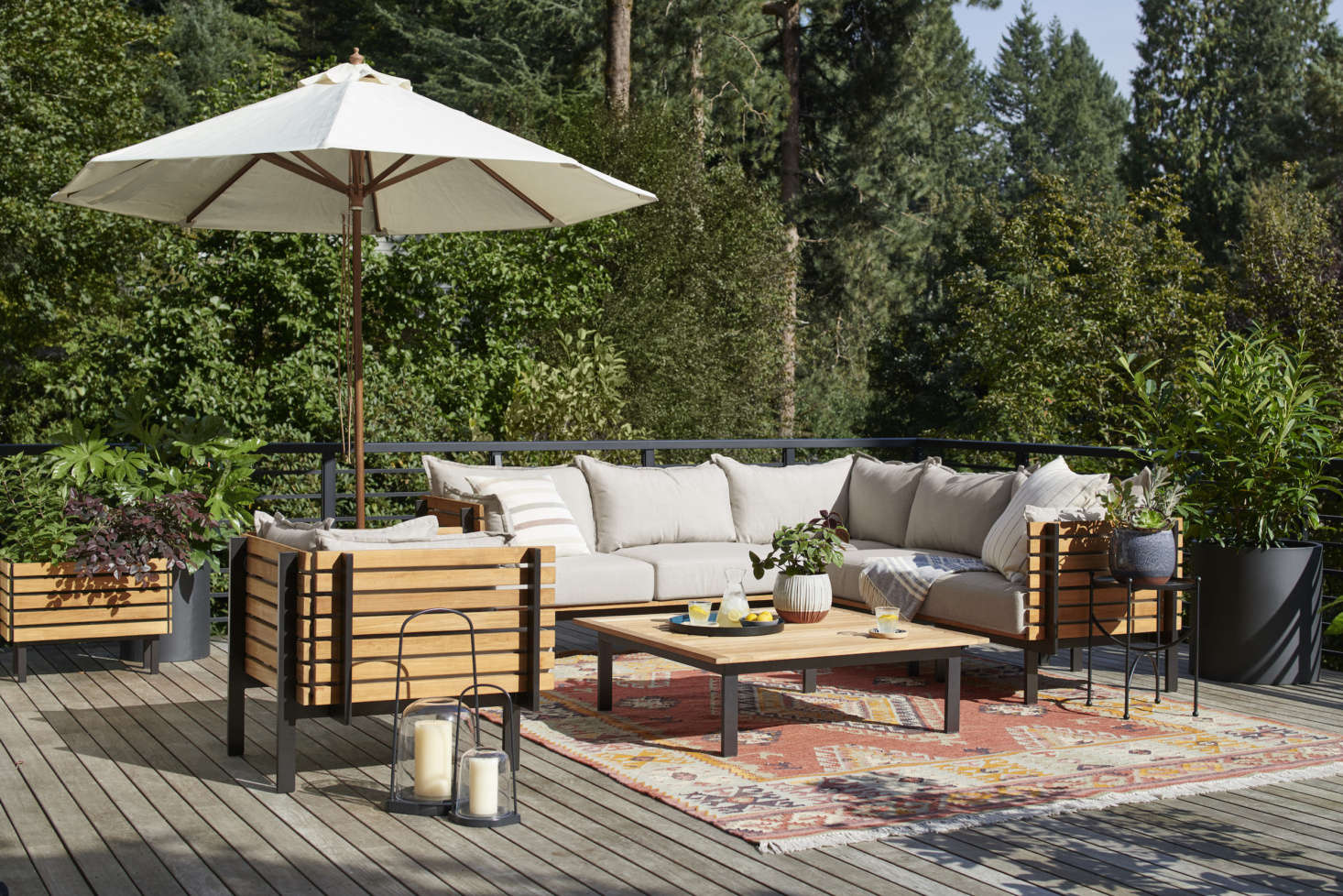 Outdoor furniture from the Jasper collection—like the Jasper Three-Piece Teak Sectional Sofa ($4,997) and Jasper Teak Arm Chair ($data-src=